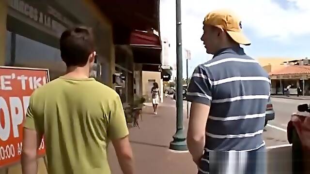 Gay boys give each other a handjob on public toilet