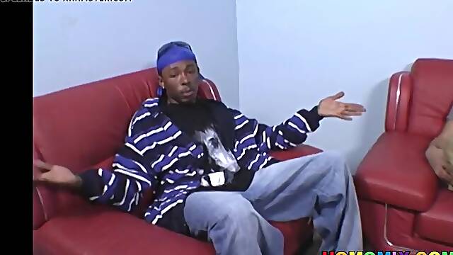 Whiteboy gives dirty deepthroat to black cock