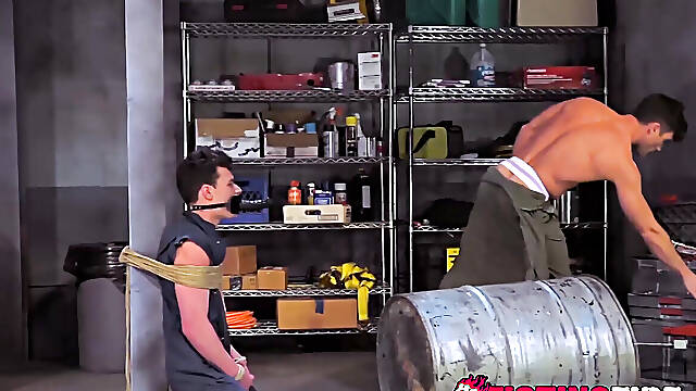 Apprentice Micky Mackenzie jerking off while gazing at a gay porn mag