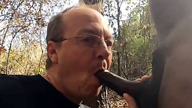 Brad sucks cock in the woods