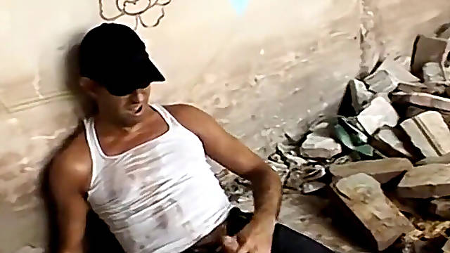 Man is milking his boner and pissing after slugging a