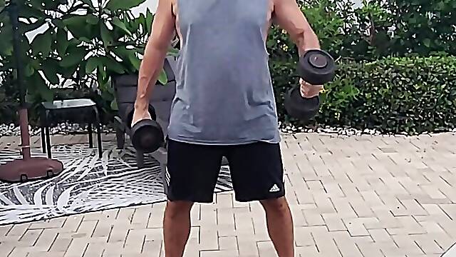 Muscle daddy loses his clothes during workout