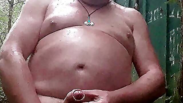 Wet and sexy pork handjob in a sensual rain