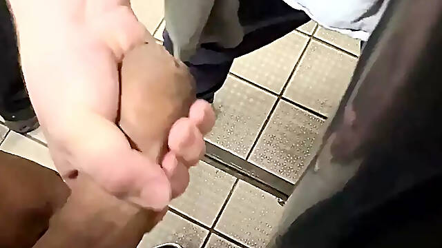 Cruising at public toilet.