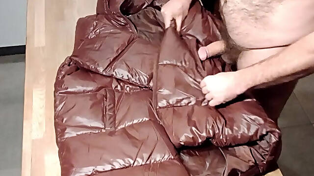 Her cherry red puffercoat lining gets my cum after a long fuck