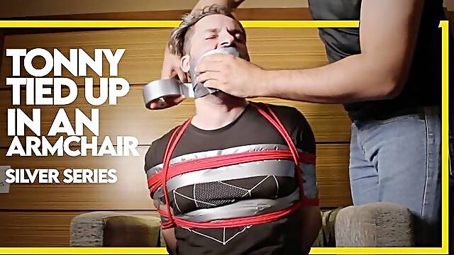 Tonny Tape tied up in armchair - Silver Series (1080p) Gay Bondage - Gay Domination - Ropes - Tape Gag - Handgag - BDSM
