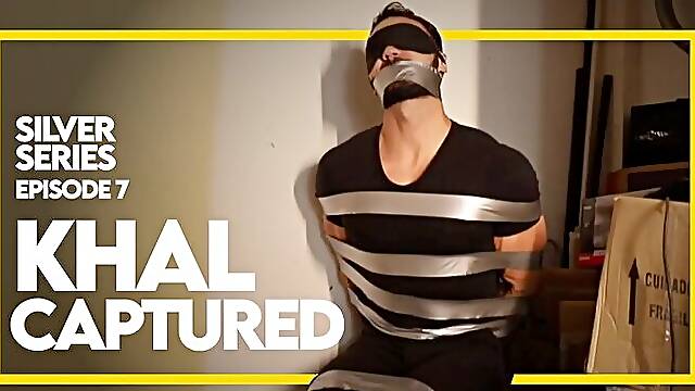 Khal Captured - Silver Series 3 - Episode 7 (1080p) Gay Bondage - Gay Domination - Tape Bondage - Muscle - Duct Tape - Blindfold - Male Bondage - Roleplay - BDSM